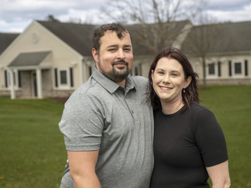 Milton Hershey School houseparents Elise and Rodger Mason outside of student home