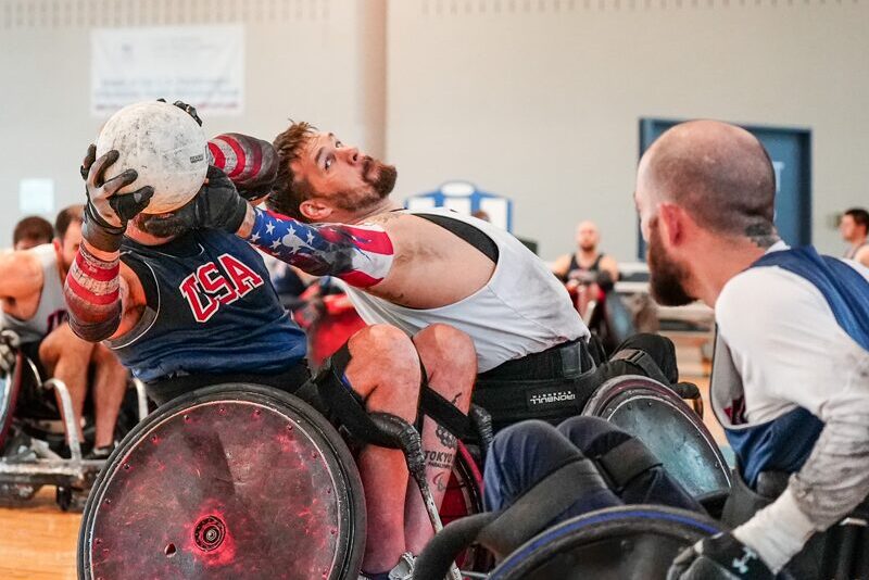 Mason Symons '07 plays in a wheelchair rugby game.