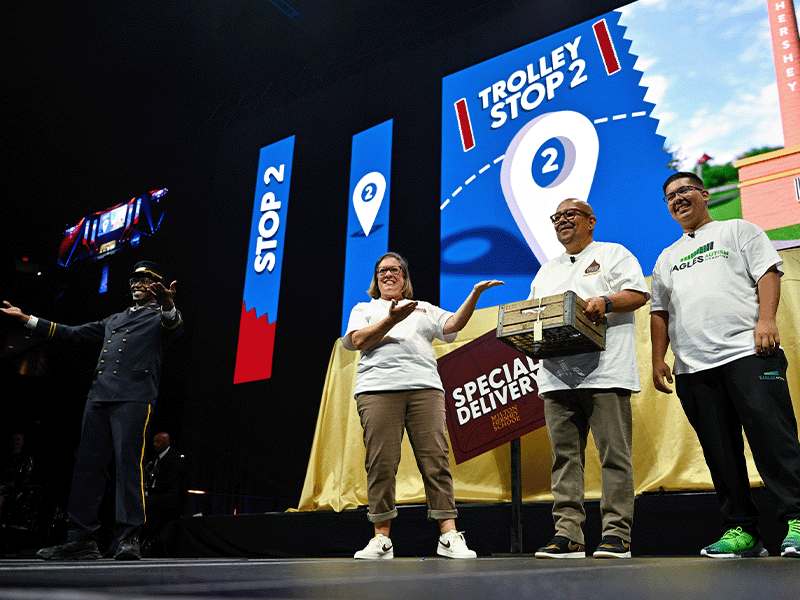 Houseparents on stage at the 2024 Opening of School Assembly